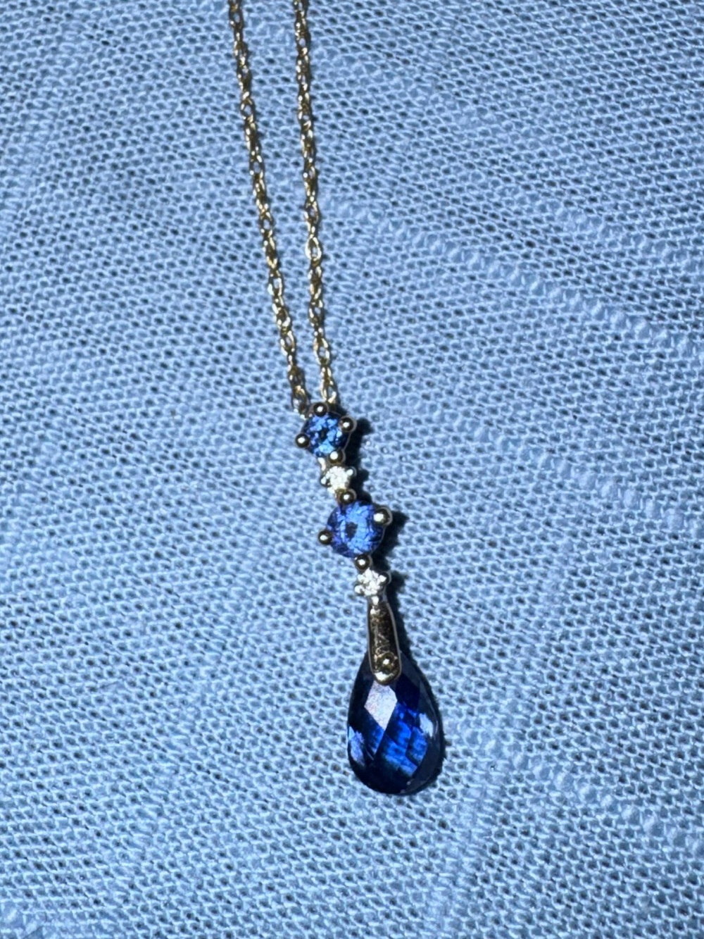 Classic Gold Necklace with Blue Teardrop Pendant